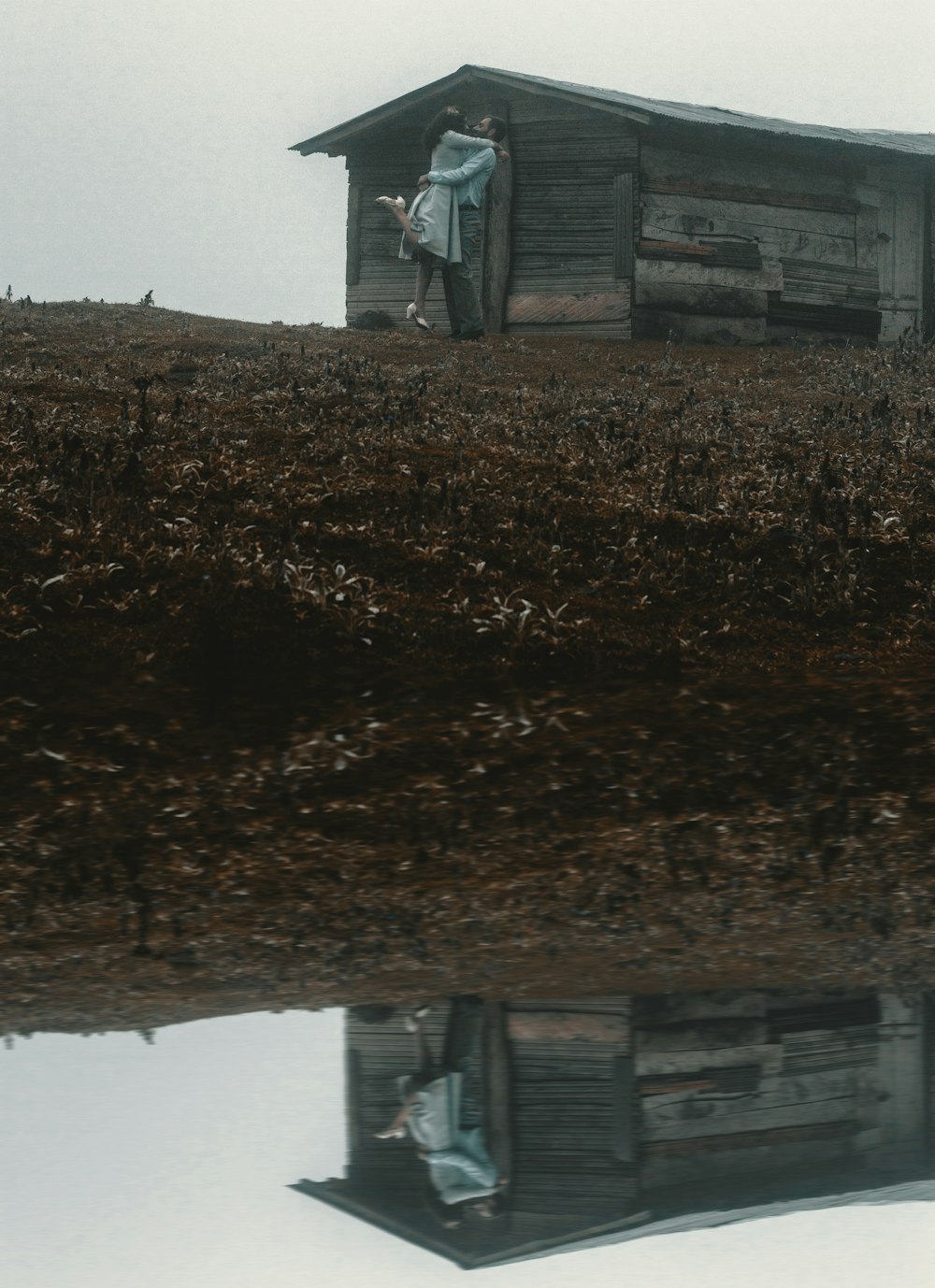 brown soil near white concrete building during daytime