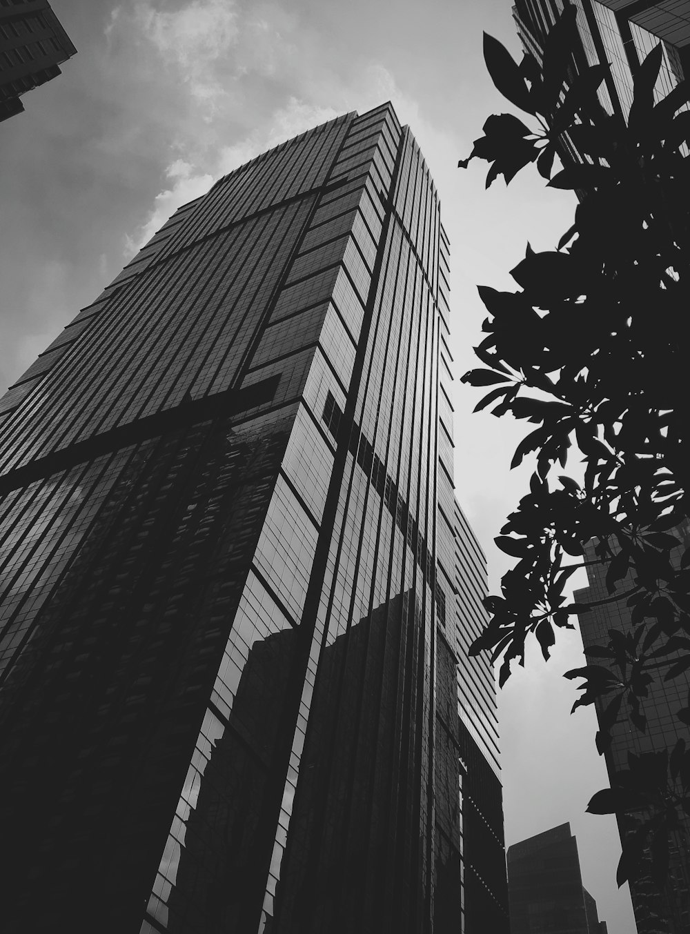 grayscale photo of high rise building