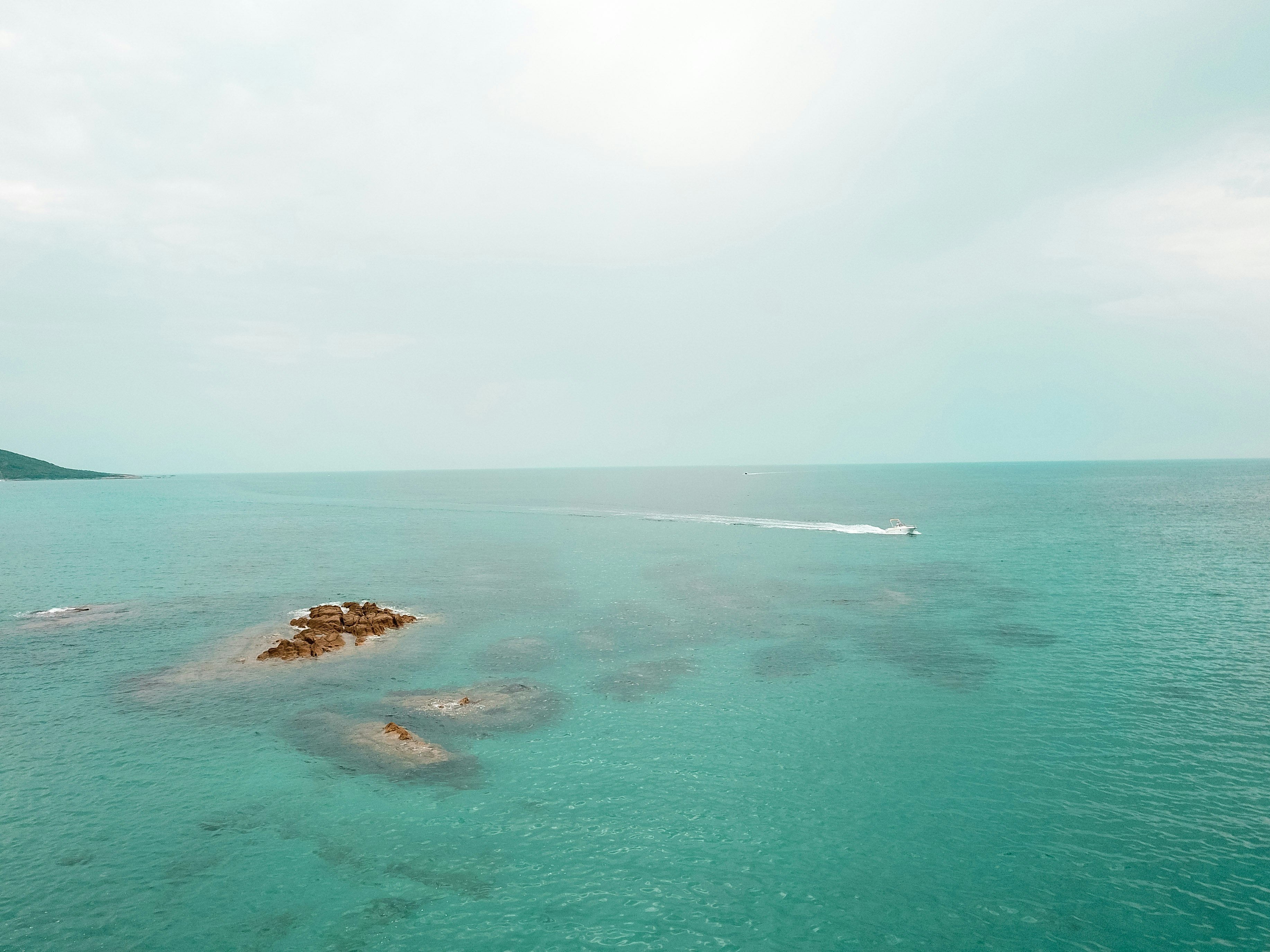 aerial view of island on sea during daytime