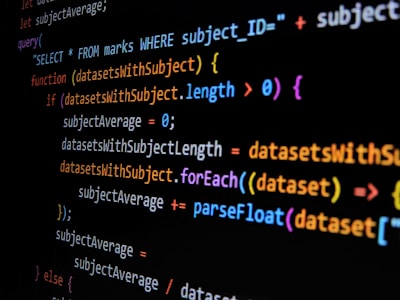 Lines of computer code are displayed on a dark background, featuring SQL and JavaScript syntax with colorful syntax highlighting. The code includes a SQL query and JavaScript function handling datasets.