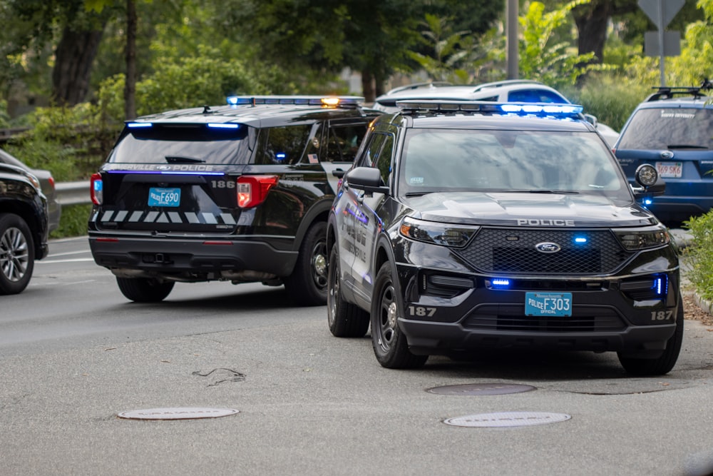 black mercedes benz suv on road during daytime