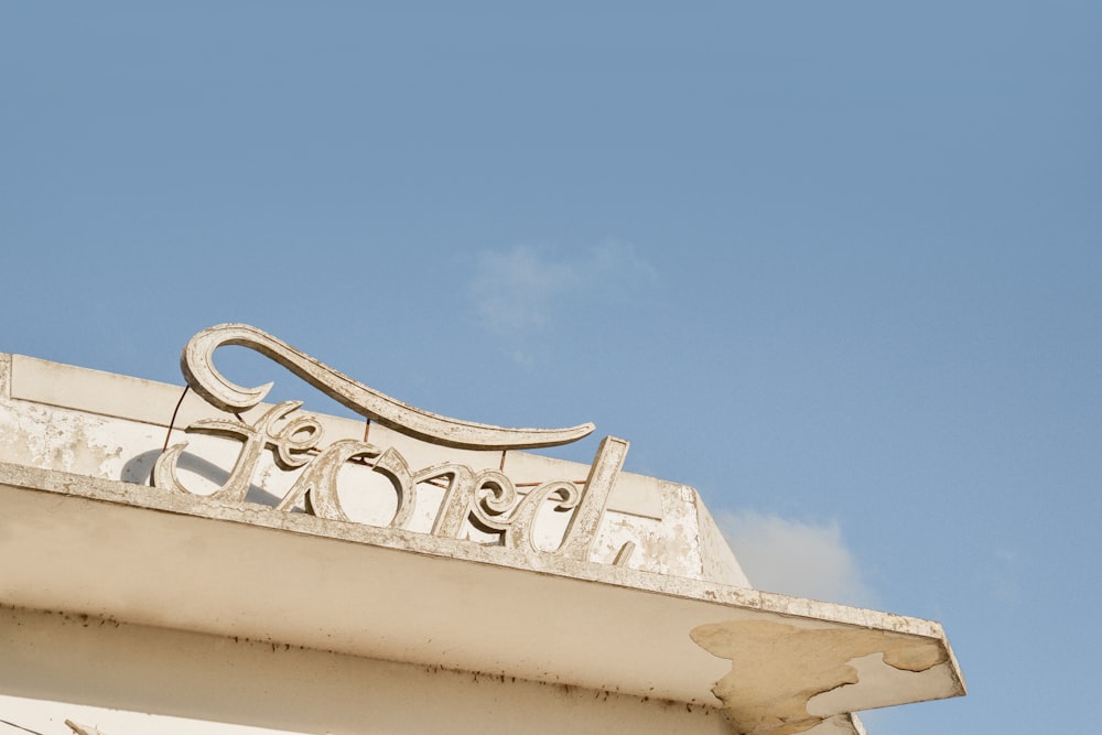 white concrete building under blue sky during daytime