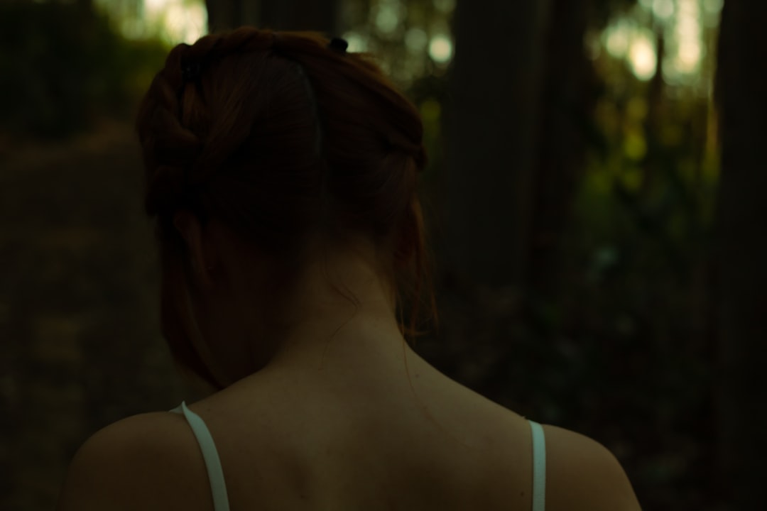 woman in white tank top