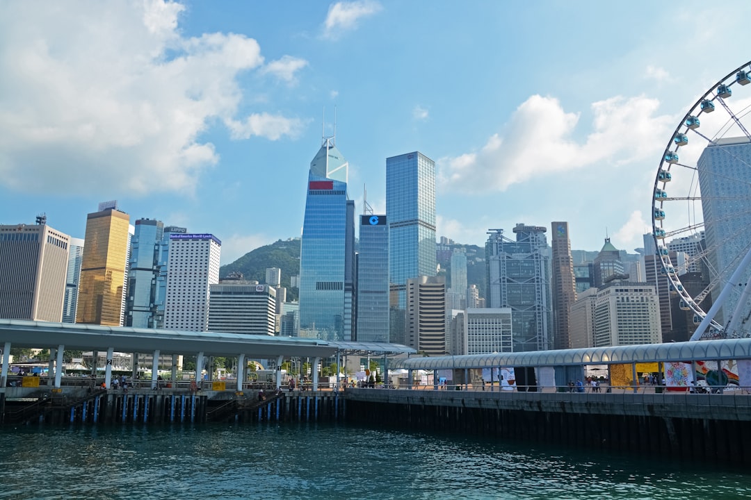 city skyline under blue sky during daytime