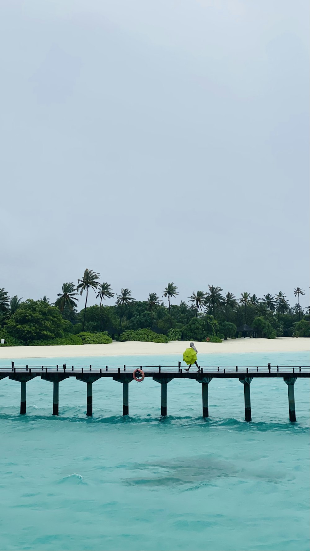 white wooden dock on sea during daytime