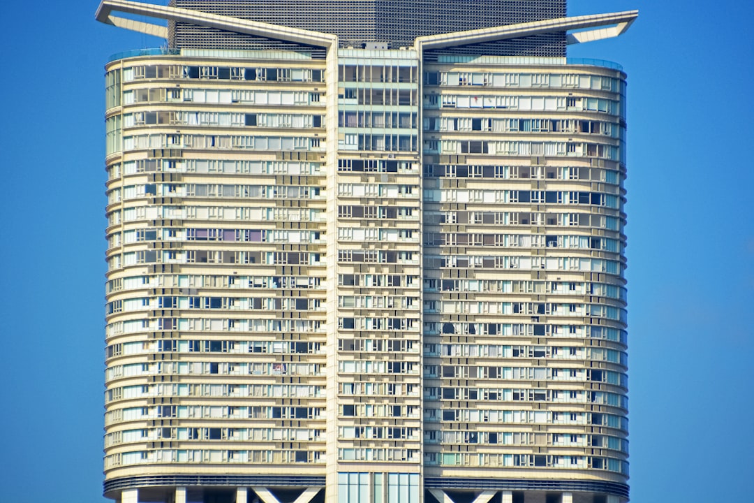 white and blue high rise building