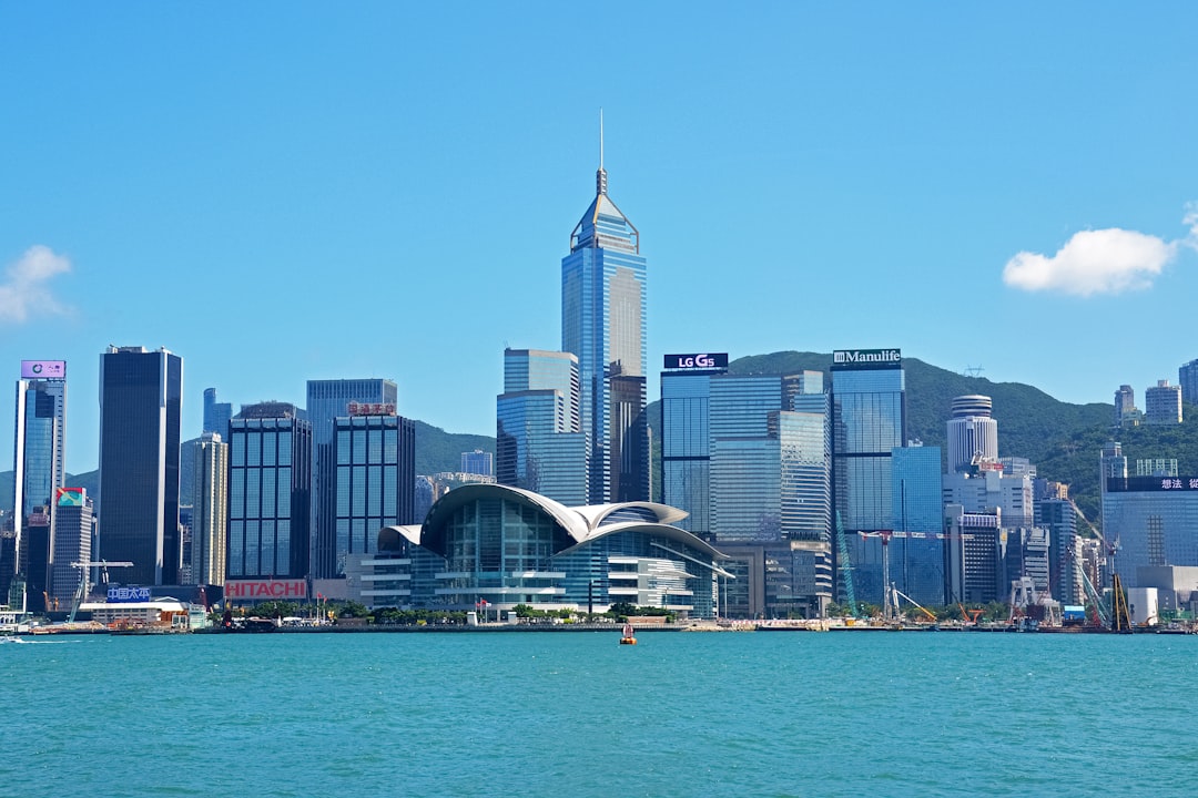 city skyline under blue sky during daytime