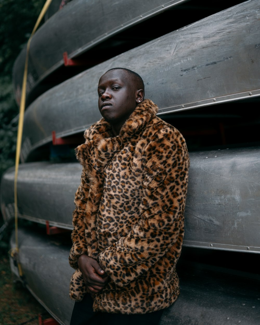 woman in brown and black leopard print coat