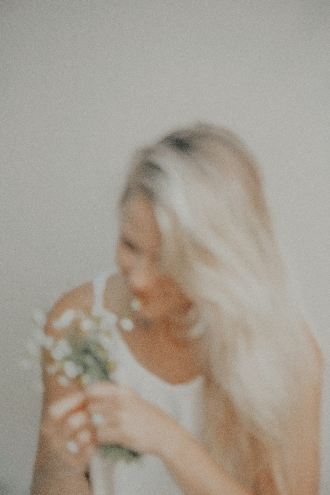 woman in white floral shirt