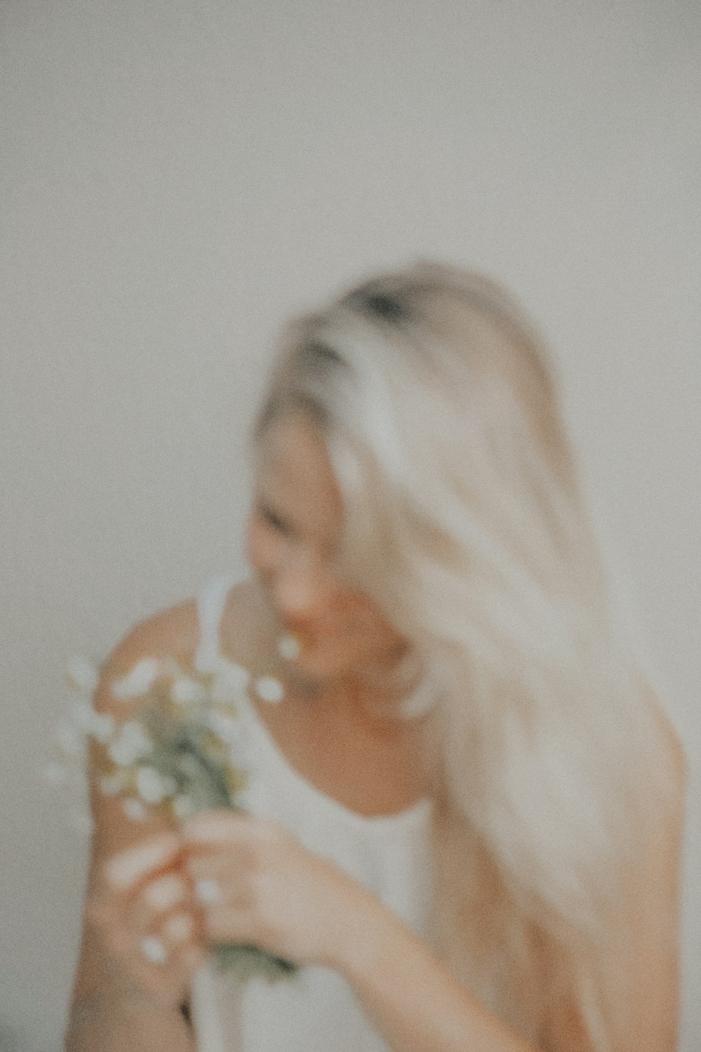 woman in white floral shirt