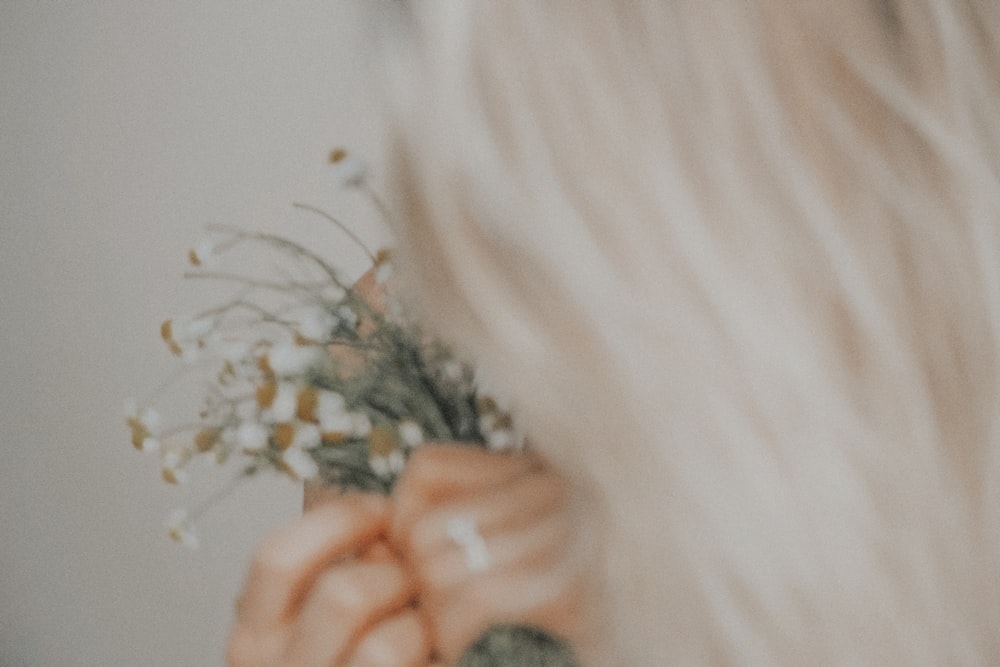 woman in black and white floral shirt