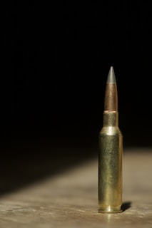 brown and gray pen on white surface