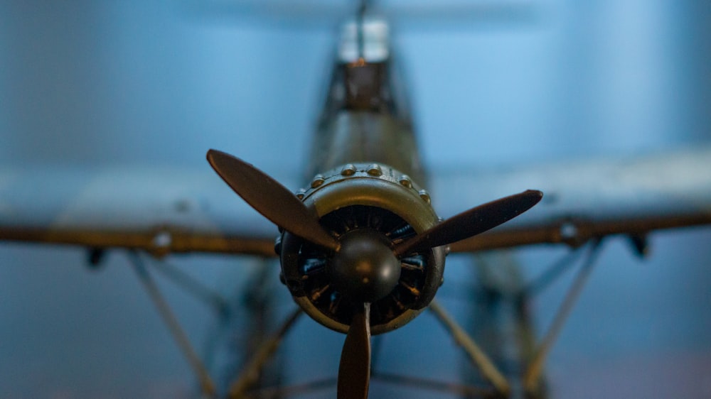 black and yellow propeller plane