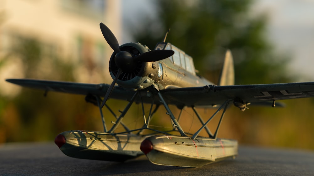 black and brown propeller plane