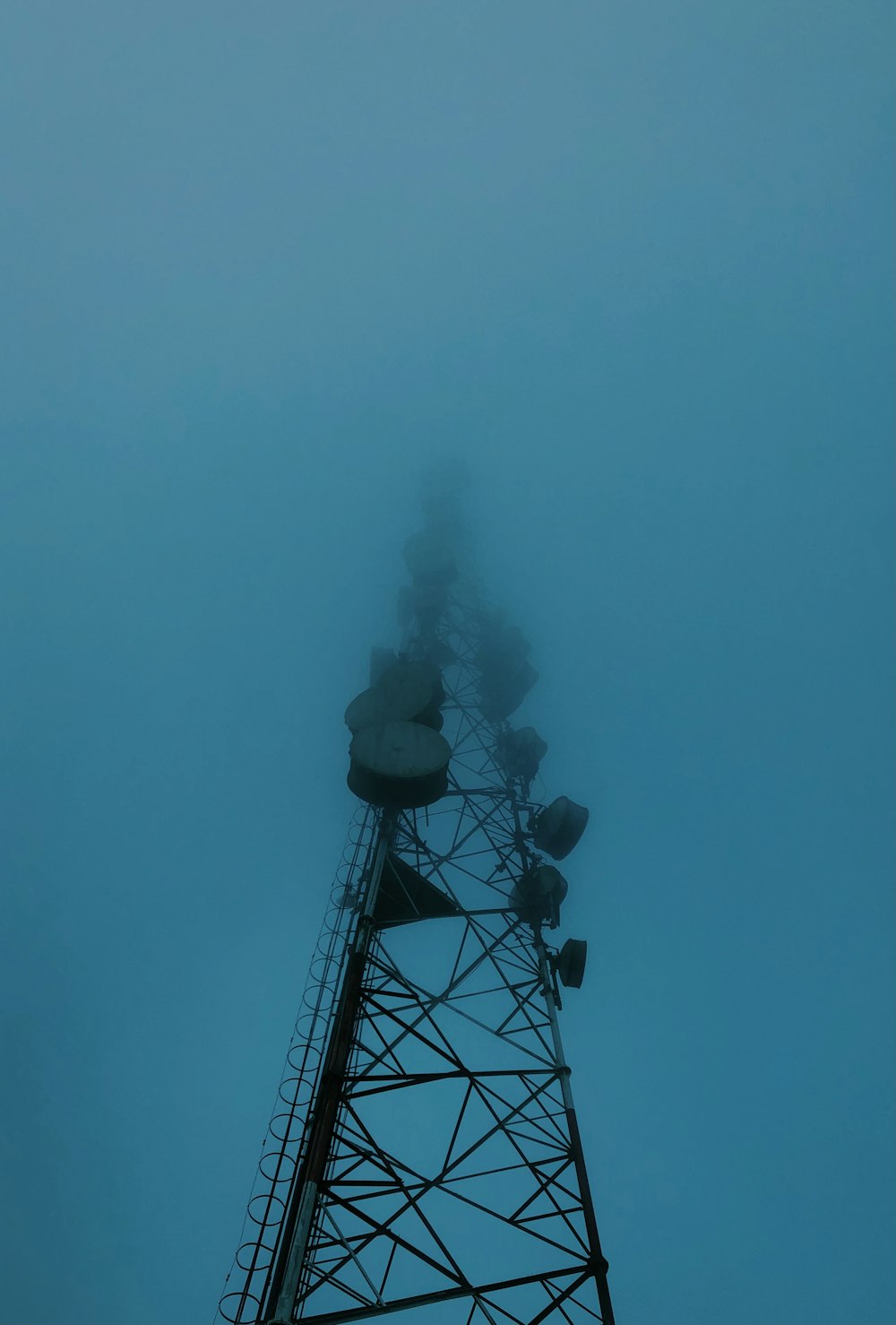 black metal tower under blue sky