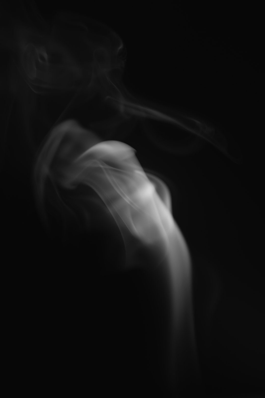 white smoke in black background