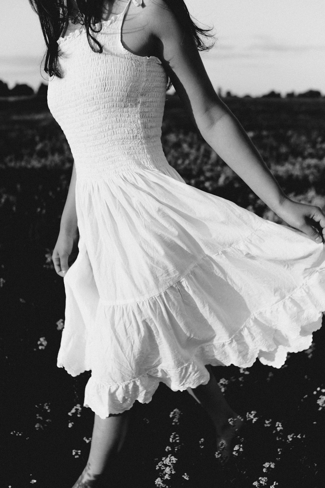 grayscale photo of woman in white dress