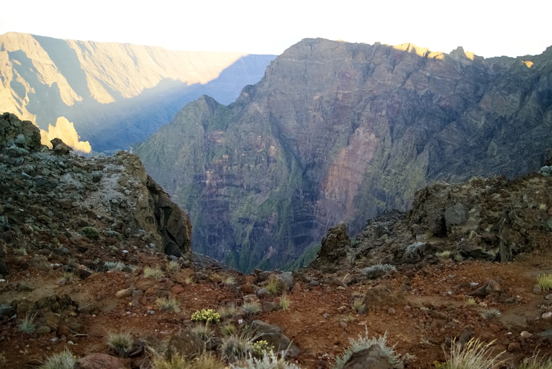 green and brown mountain under blue sky during daytime