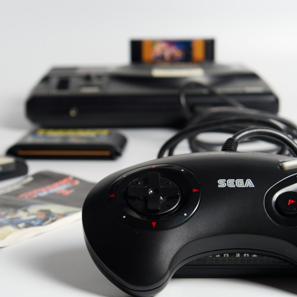 black game controller on white table