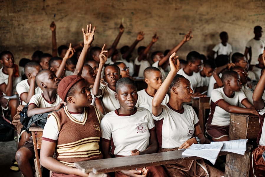 Teacher with students, African classroom