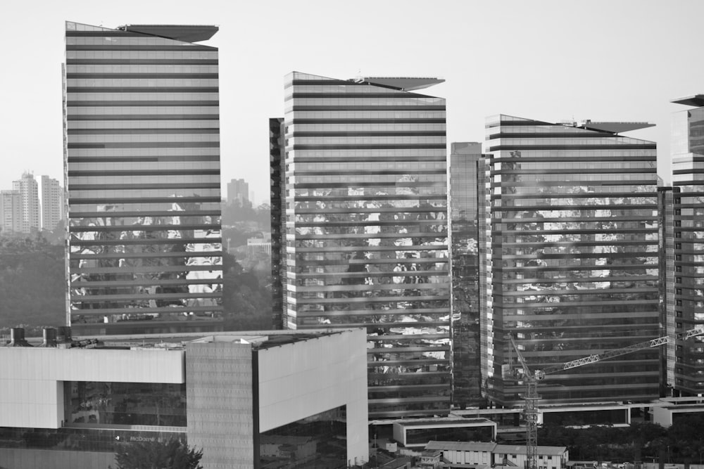 grayscale photo of city buildings