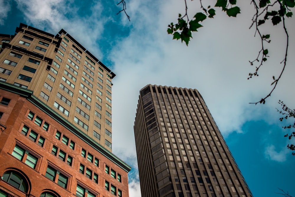 brown concrete building under cloudy sky during daytime