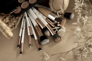 brown and white makeup brush set