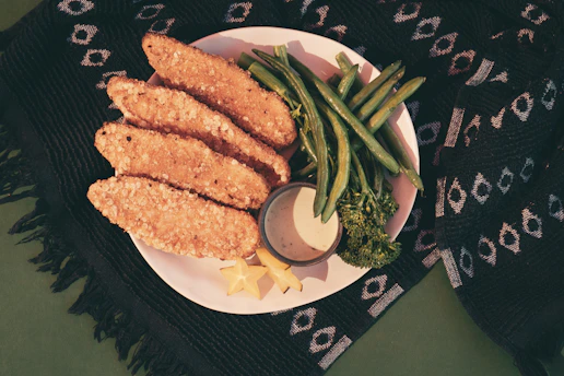 grilled fish on white ceramic plate