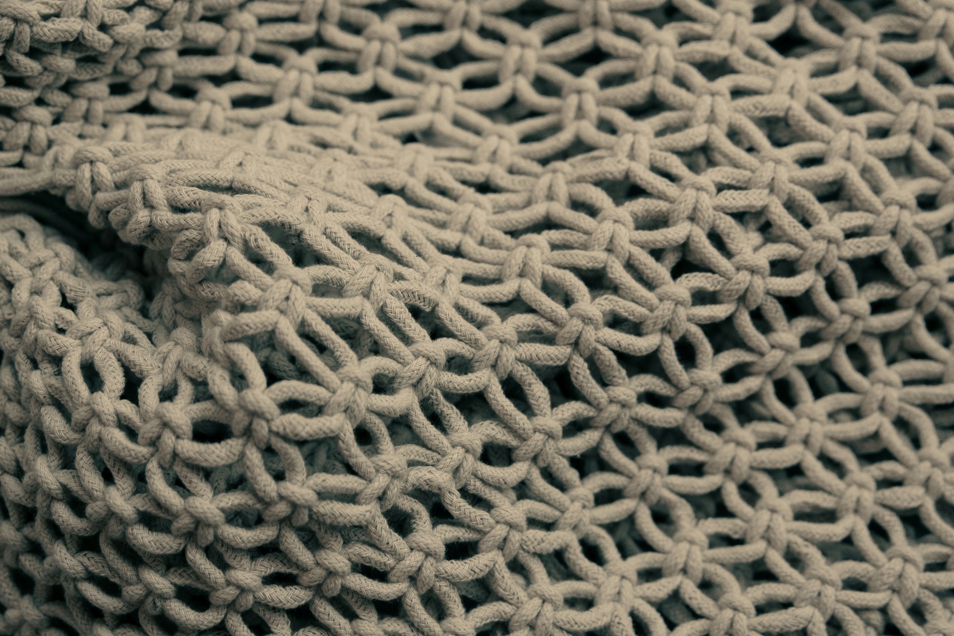 brown knit textile in close up photography