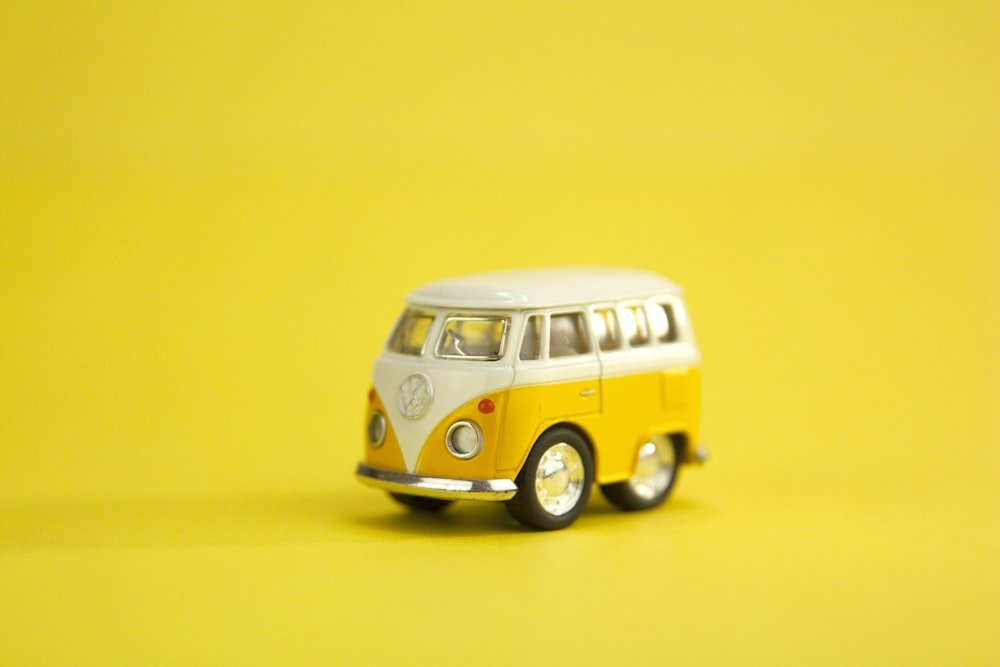 yellow and white volkswagen t-1 scale model