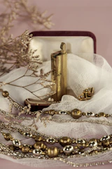 Display of elegant smoking accessories including lighters and cases.