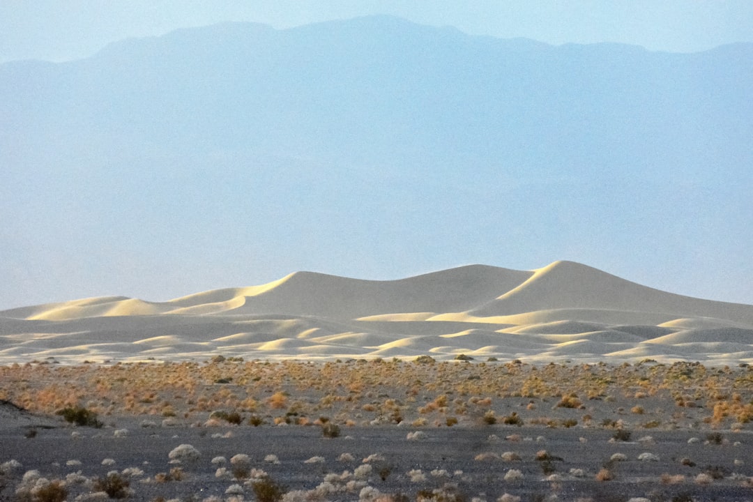 brown mountain under white sky during daytime