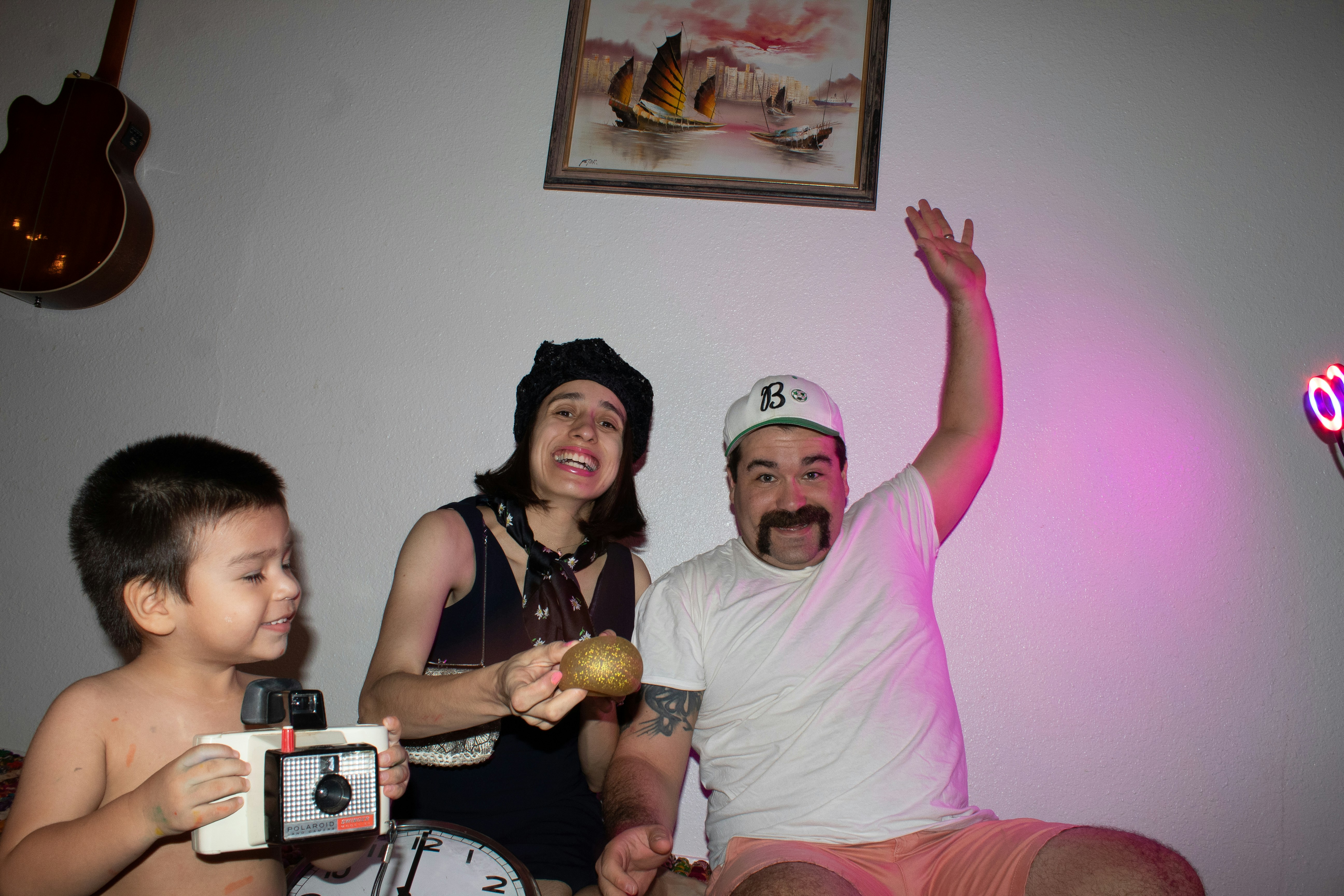 man in white crew neck t-shirt beside woman in black tank top