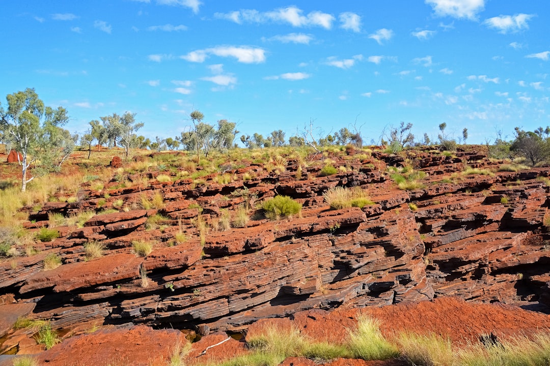 brown rock formation under blue sky during daytime