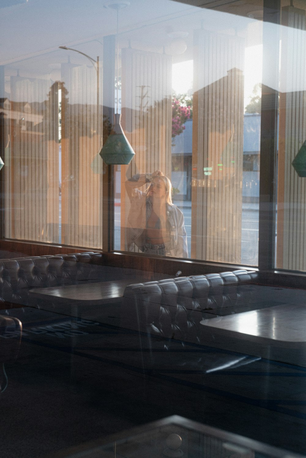 black leather chairs near glass window