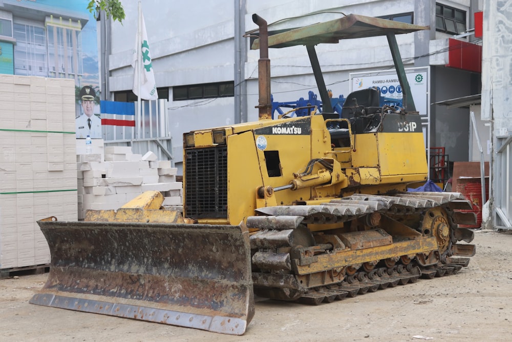 yellow and black front loader