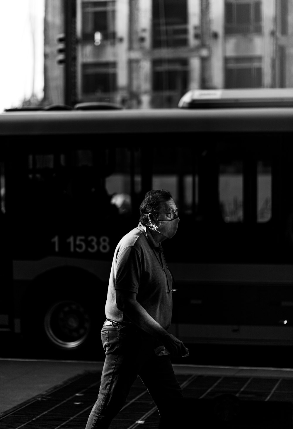 grayscale photo of man in dress shirt and sunglasses