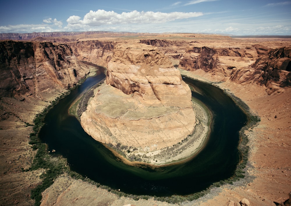 brown rock formation under blue sky during daytime