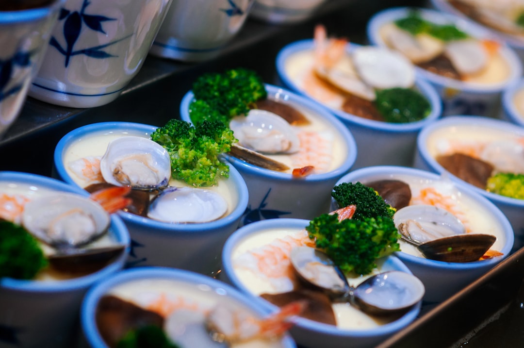 white ceramic bowl with green vegetable