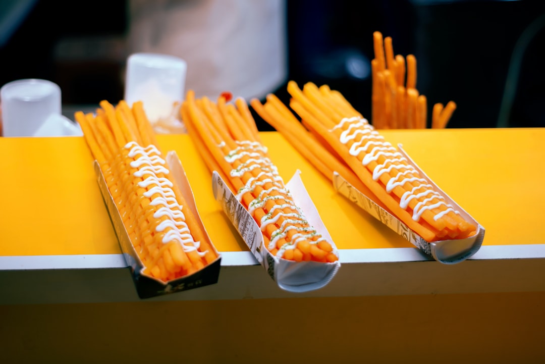 yellow and black plastic pack on white table