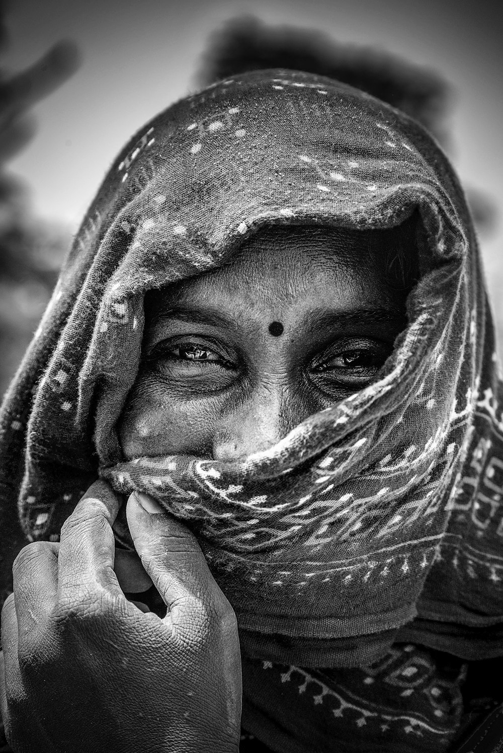 grayscale photo of woman wearing hijab