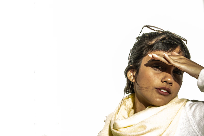 Indian sugar mama in a stylish yellow and white floral scarf