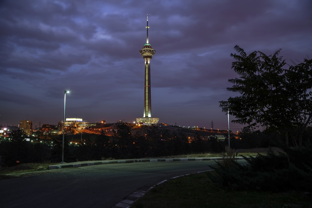 white concrete tower under gray sky