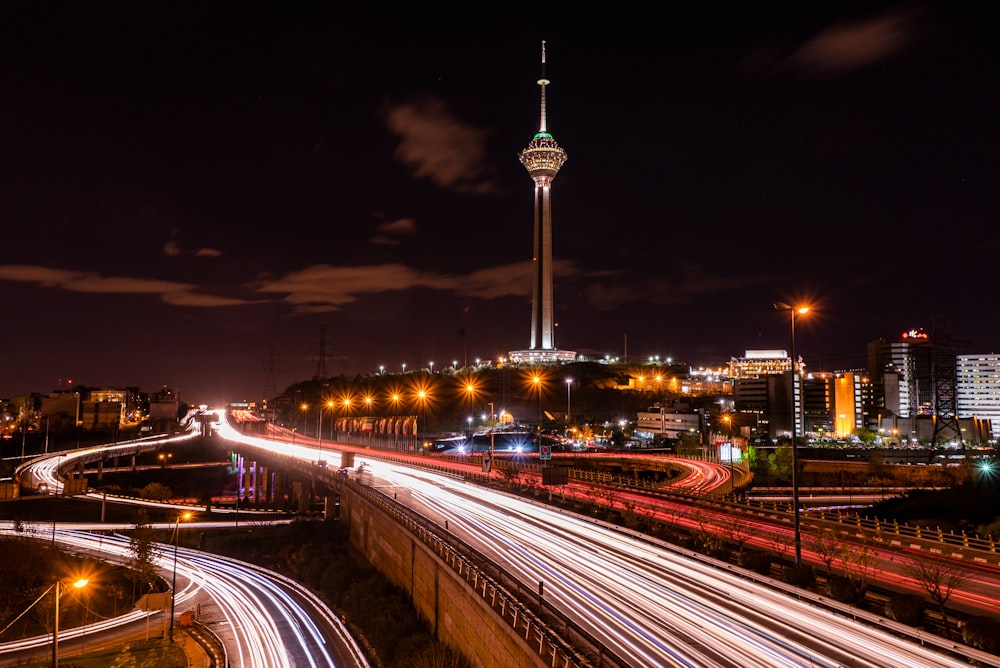 time lapse photography of city road during night time