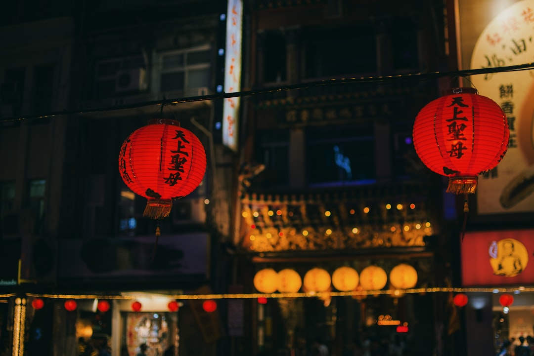 red lantern on street during night time