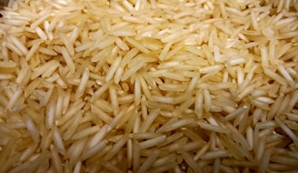 white rice on brown wooden table