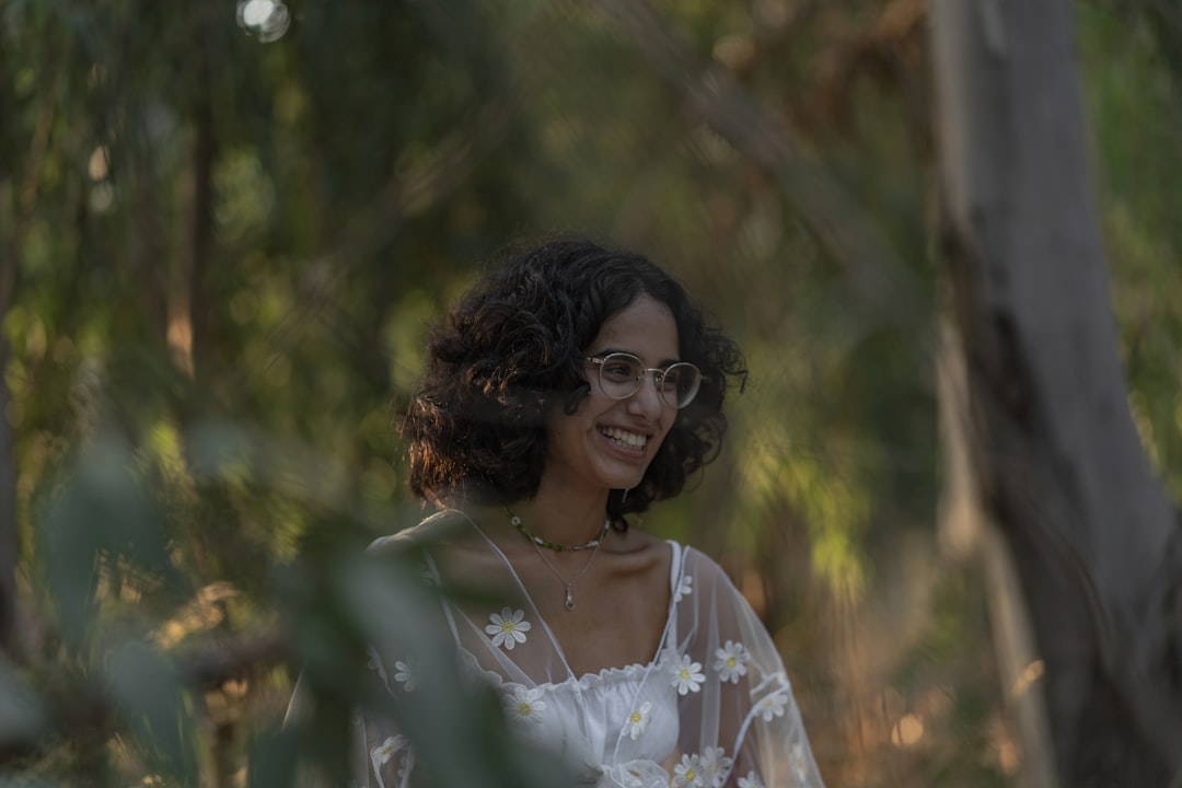 woman in white floral dress