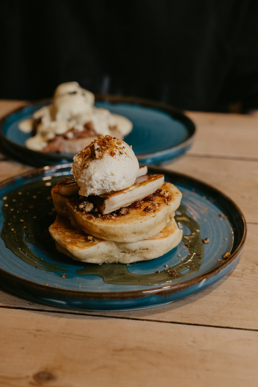 white and brown pastry on blue ceramic plate