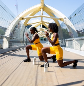 woman in yellow shorts sitting on yellow chair