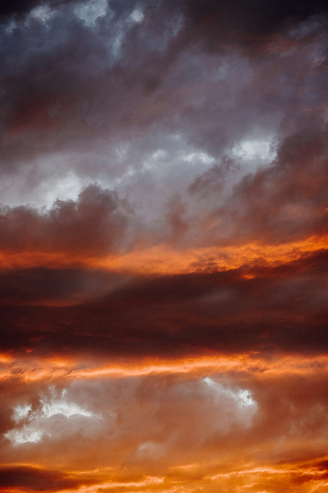 orange and black clouds during sunset